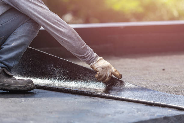 Professional Waterproofing technician working in West Newton, PA